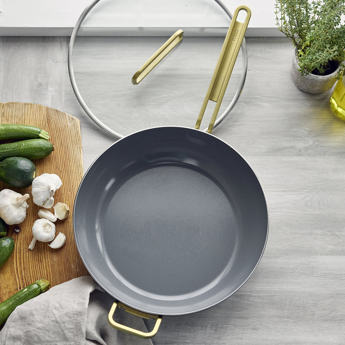 Stanley Tucci™ Stainless Steel Ceramic Nonstick 6.5-Quart Essential Stanley Pan with Lid | Champagne Handle