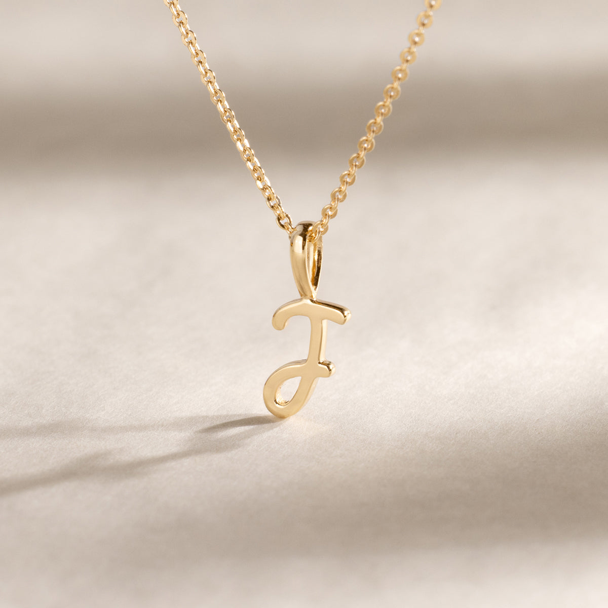 Script Initial M Charm